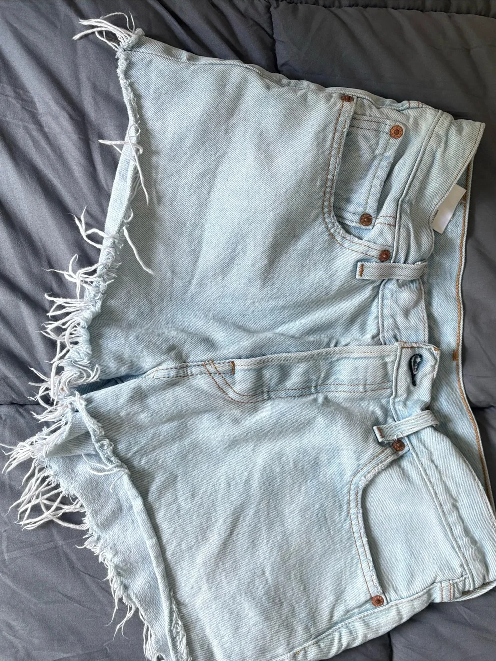 Levi's Light Blue Frayed Hem Cropped Denim Shorts